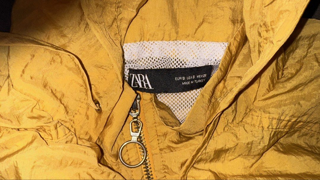 Zara Yellow Hooded Windbreaker (Category: Coats, Jackets and Outerwear) located in Manila. Submitted by klmesco (Listing ID 1467058824, Image 2). Description: - Size: S - Color: Bright yellow - Breathable white mesh lining inside - RFS: Decluttering, need funds 🥹.
