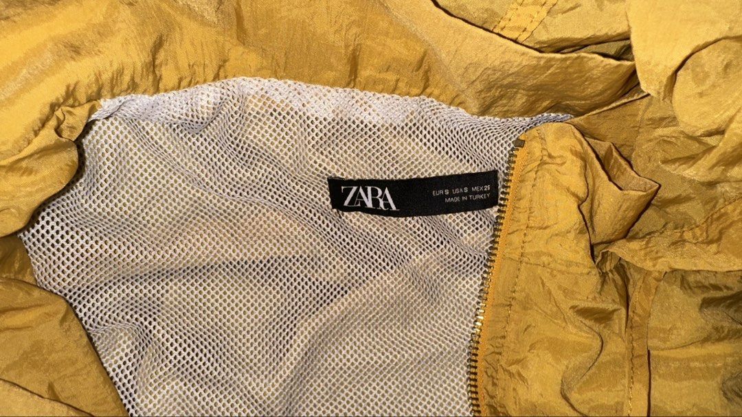 Zara Yellow Hooded Windbreaker (Category: Coats, Jackets and Outerwear) located in Manila. Submitted by klmesco (Listing ID 1467058824, Image 3). Description: - Size: S - Color: Bright yellow - Breathable white mesh lining inside - RFS: Decluttering, need funds 🥹.