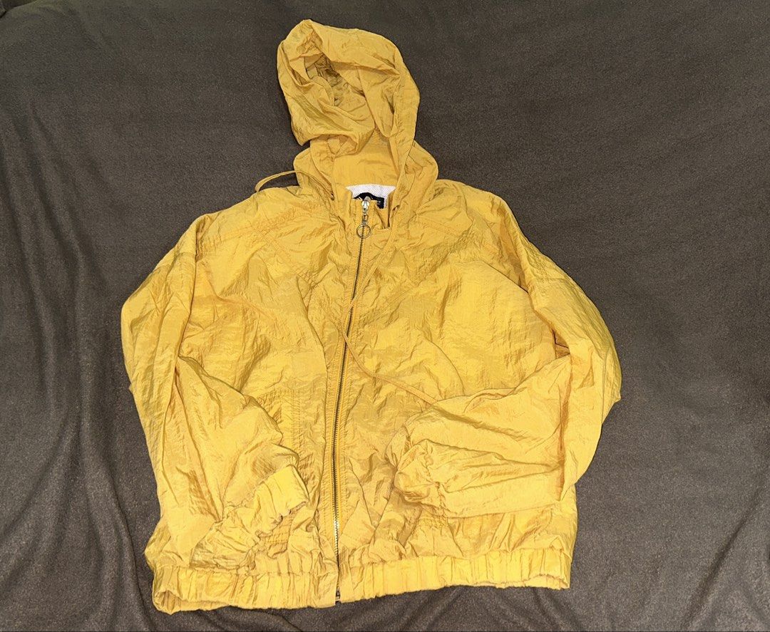 Zara Yellow Hooded Windbreaker (Category: Coats, Jackets and Outerwear) located in Manila. Submitted by klmesco (Listing ID 1467058824, Image 1). Description: - Size: S - Color: Bright yellow - Breathable white mesh lining inside - RFS: Decluttering, need funds 🥹.