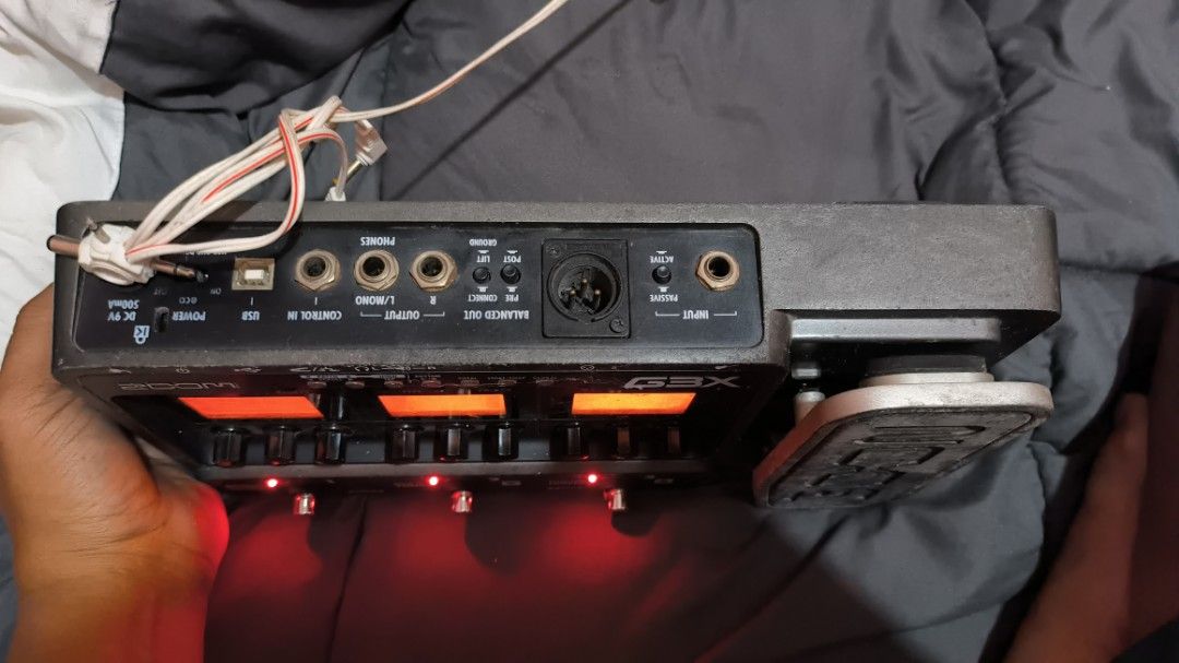 Zoom G3X Guitar Effects and Amp Simulator Pedal (Category: Musical Instruments) located in Manila. Submitted by knsenpai (Listing ID 1466999025, Image 2). Description: - Zoom G3X multi-effects pedal for electric guitar - Integrated expression pedal for real-time control - 3 large LCD screens for easy viewing of patches, delays, EQ, and leads - 3 footswitches for patch navigation, built-in tuner, and looper functions - Rear panel includes input, b