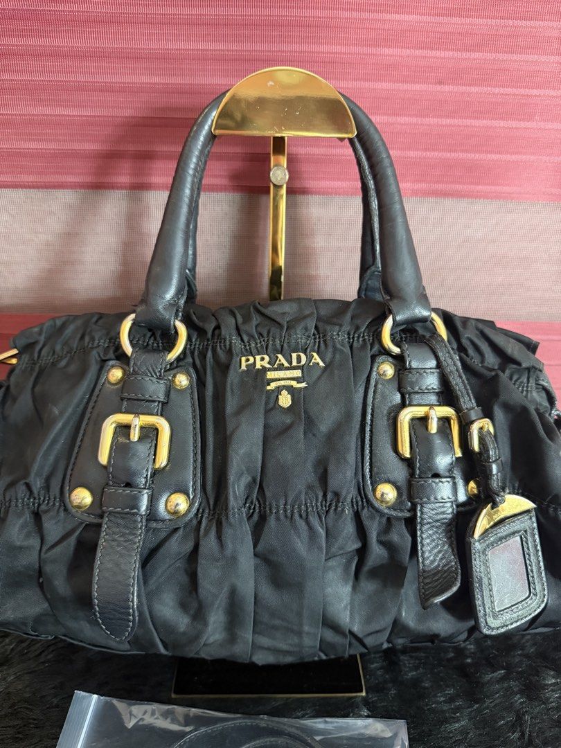 100% Authentic Prada Shoulder Bag (Category: Luxury Bags & Wallets) located in Manila. Submitted by cookie.declutters (Listing ID 1467222864, Image 2). Description: 100% Authentic Prada Nylon Bag. With signs of usage and handle has some dryness already. Price is slightly negotiable. .