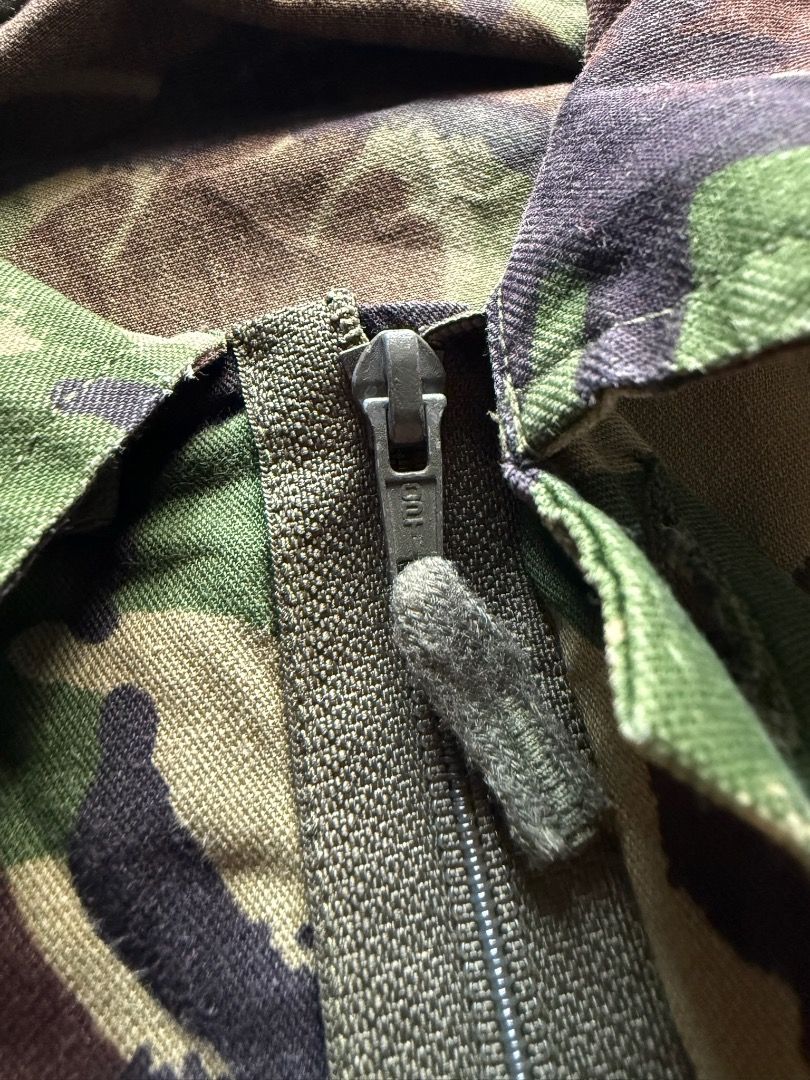 1990's British Army DPM Combat Lightweight Jacket (Category: Coats, Jackets and Outerwear) located in Pasig City. Submitted by hoardwrld (Listing ID 1467180066, Image 3). Description: Width: 23.5 Length: 31.5 - Authentic British military field shirt in classic DPM woodland camouflage - Heavy-duty, durable cotton fabric built for rugged wear - Button-down front featuring dual chest cargo pockets - Distinct rank tab on the chest placket and sturdy 