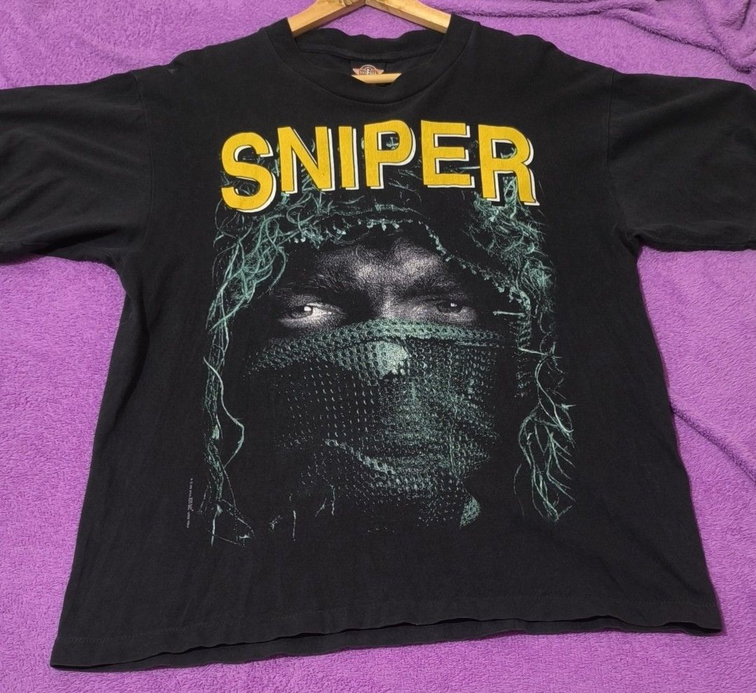 1998 SNIPER ONE SHOT ONE LIFE (Category: Tshirts & Polo Shirts ) located in Dumaguete. Submitted by nostaldripph (Listing ID 1467317889, Image 1). Description: ROCK EAGLE TAG SINGLE STITCHED 21*28 HAIRLINE CRACKS.