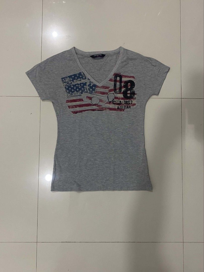 2000s V-neck Converse Shirt (Unisex) (Category: Tshirts & Polo Shirts ) located in Davao. Submitted by bulletproofssoul (Listing ID 1467323429, Image 1). Description: authentic, good condition, already washed, no issues, price is still negotiable. 📩 pm for negotiation & details. MEASUREMENTS: width (pit-to-pit) - 15.5 inches length - 23.5 inches.