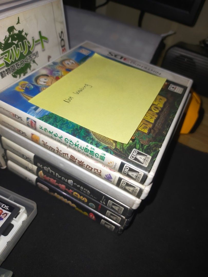 3DS AND DS GAMES (Category: Nintendo) located in Manila. Submitted by reichan_36 (Listing ID 1467206341, Image 2). Description: - Take all for 4000 Boxed & Loose cartridges with case The ones stacked vertically are either defective or they just need cleaning (see sticky note) The rest are still in good condition !Every game is in Japanese Language!.