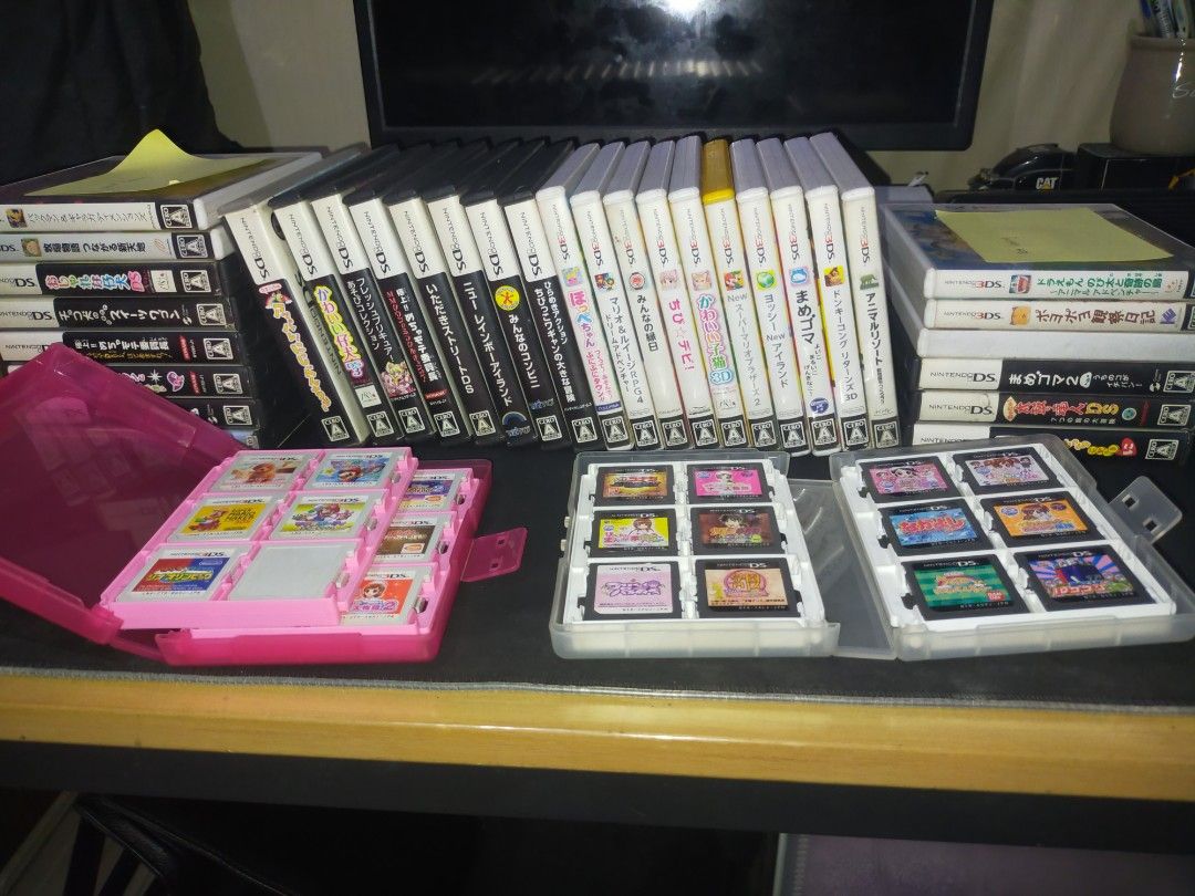 3DS AND DS GAMES (Category: Nintendo) located in Manila. Submitted by reichan_36 (Listing ID 1467206341, Image 1). Description: - Take all for 4000 Boxed & Loose cartridges with case The ones stacked vertically are either defective or they just need cleaning (see sticky note) The rest are still in good condition !Every game is in Japanese Language!.