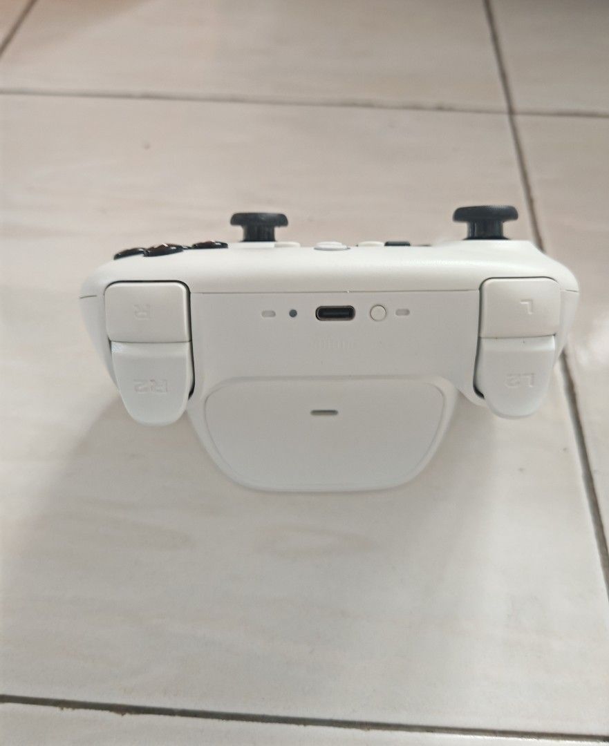 8BitDo Ultimate Bluetooth Controller (Switch/Windows) (Category: Controllers) located in Alor Setar. Submitted by abigailcheong (Listing ID 1467320010, Image 3). Description: - Model: 8BitDo Ultimate Bluetooth Controller (White) - Compatibility: Nintendo Switch & Windows PC - Inclusions: Matching charging dock and original box - Condition 7/10 - COD in Penang or +RM8 delivery fees.