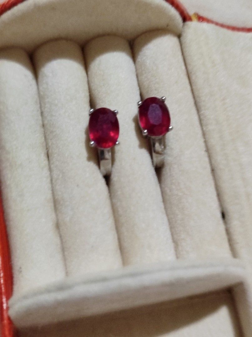 925 Silver Oval Ruby Gemstone Leverback Earrings (Category: Earrings) located in Cavite. Submitted by noblepenguin_6c8662 (Listing ID 1467229572, Image 1). Description: - Stunning oval ruby gemstone earrings - Crafted with 925 stamped sterling silver - Features secure leverback closure for easy and safe wear - Naturally fluorescent: glows bright pinkish-red under UV light - Securely prong-set stones with nicely polished metal in clean condition.