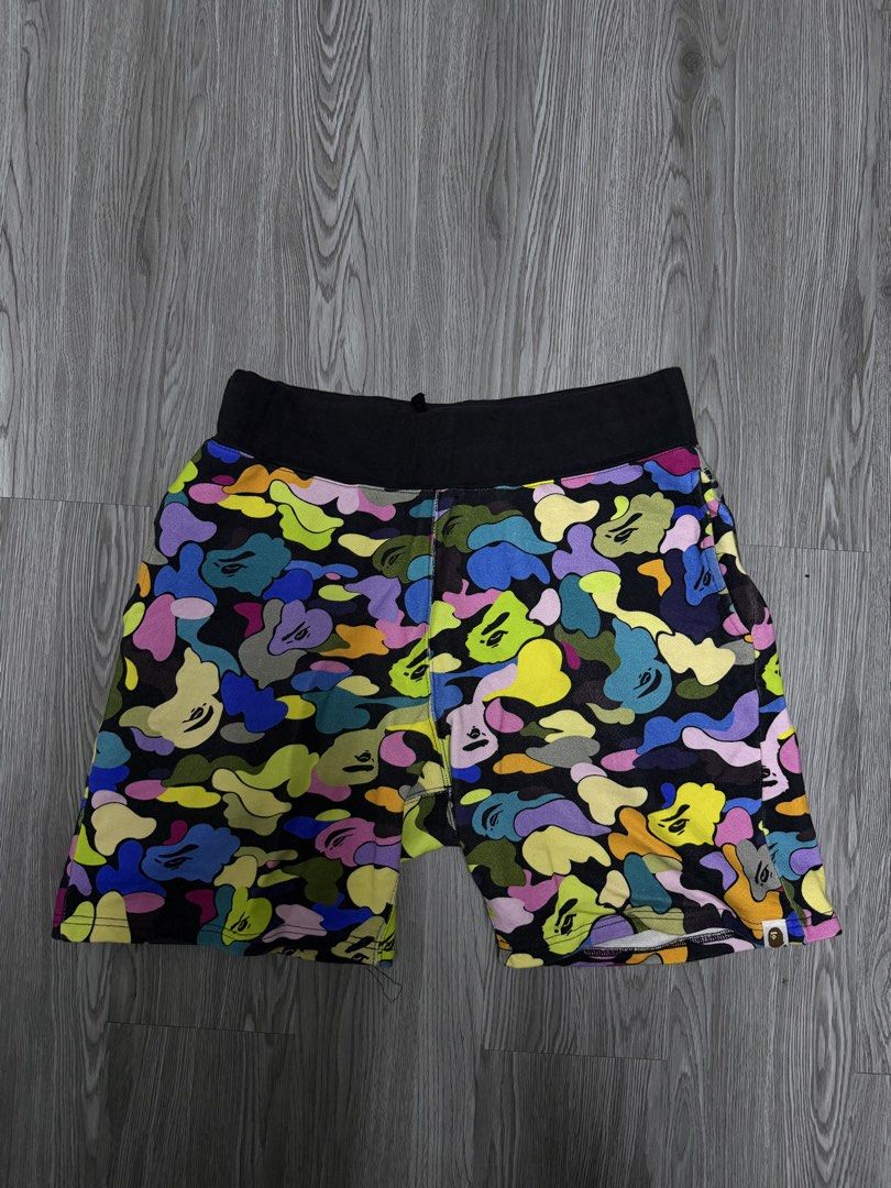 A Bathing Ape Multi-Color Camo Sweatshorts (Category: Shorts) located in Manila. Submitted by yourfavoriteplug (Listing ID 1467229619, Image 1). Description: - Brand: BAPE (A Bathing Ape) - Design: Iconic multi-color camouflage print - Fit: Comfortable elastic waistband, Size Medium - Details: Right back pocket, signature Ape head logo tag on lower hem - Condition: Brand new with inner tags - Ideal for: Streetwear, casual wear, and everyday comfo