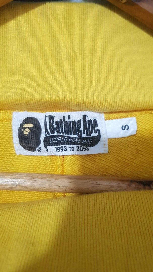 A Bathing Ape Shark Yellow Shorts (Category: Shorts) located in Manila. Submitted by nice430 (Listing ID 1467296592, Image 3). Description: - Brand: BAPE (A Bathing Ape) - Item: Shark Shorts - Color: Yellow with blue and white accents - Size: Small (S) - Material: 90% cotton, 10% nylon - Features: Iconic shark face graphic, adjustable drawstring waistband, striped leg trim - Origin: Made in China - Condition: Brand new / Excellent quality streetw