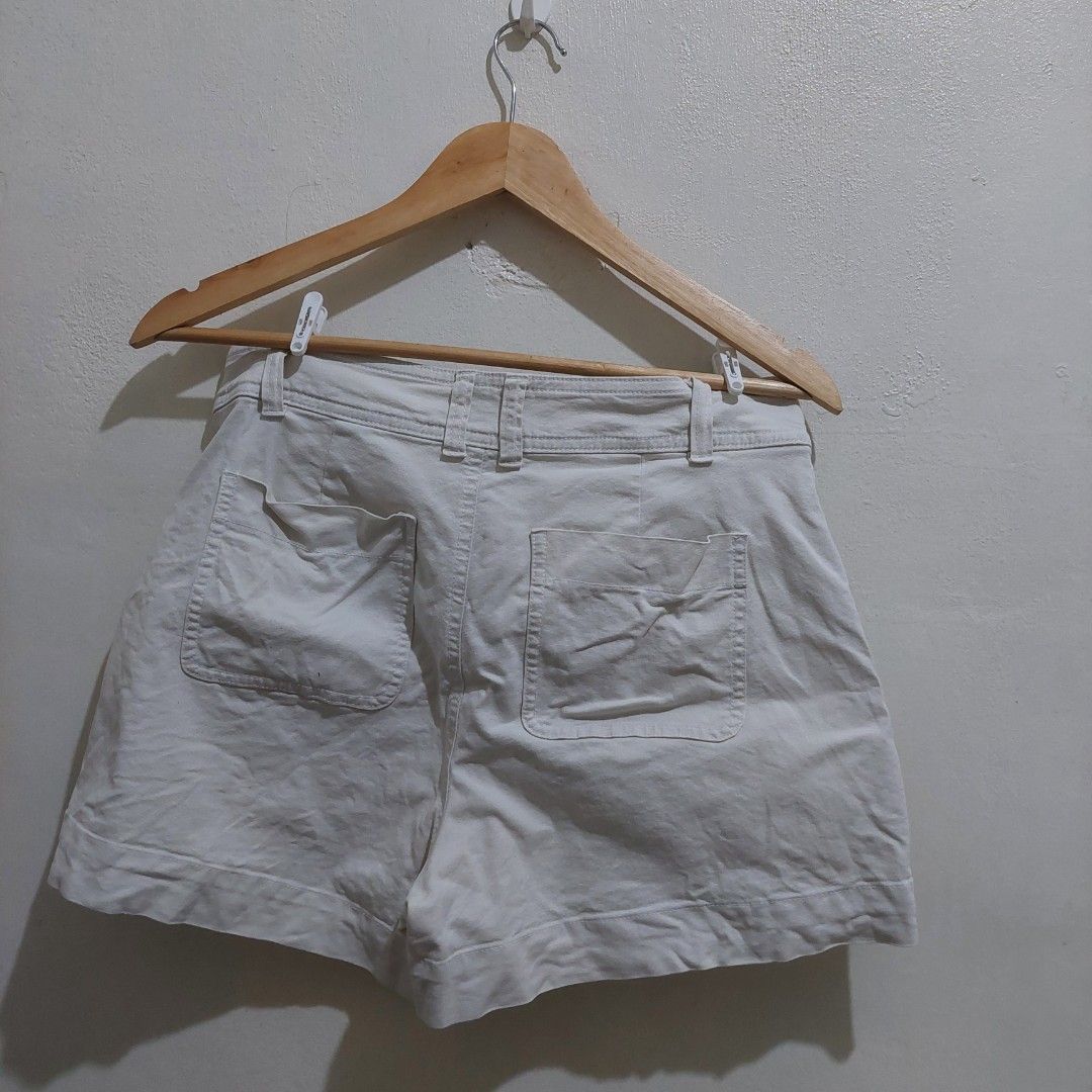 A New Day White Stretch Shorts (Category: Shorts) located in Governor Generoso. Submitted by cma_rarefitph (Listing ID 1467176865, Image 2). Description: - Brand: A New Day - Color: White - Style: Stretch shorts with front double-button closure and belt loops - Pockets: Large patch pockets on both front and back - Fit & Fabric: Clean fabric, comfortable stretch, great for warm weather - Versatility: Easy to style with casual tees and tank tops.