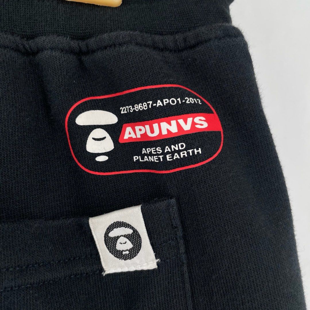 AAPE Black Universe Jogger Pants (Category: Joggers) located in Manila. Submitted by buzz.garments (Listing ID 1467352597, Image 3). Description: Size: Large on tag Dimensions(inches) -Waist/Width: 30”-40” (Strechable) -Hip: 20” -Front Rise: 13” -Thigh: 12” -Inseam: 27” -Outseam/Length : 37” -Leg Opening: 5” - color may vary due to lighting. please manage your expectations-minimal and unseen flaws must be considered..