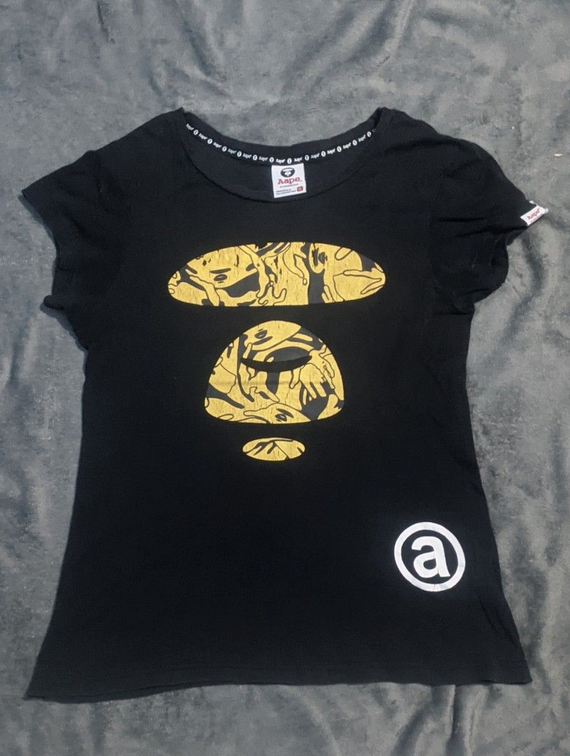 Aape By A Bathing Ape Black Graphic Tee (Category: Shirts) located in San Ildefonso. Submitted by tripniberto (Listing ID 1467309355, Image 1). Description: AAPE Dimes:17W/24L Issue: Need wash, Hairline/Crack prints, Sign of use Color Rate: 8.7/10(or better) (lighting may affect the color on images) MOP: gcash MOD: j&t(+sf) NO RUSH SHIPPING!!! (3-5days Ship out!) please manage your expectations this is ukay items PM if interested 📩 Bulacan 📍.