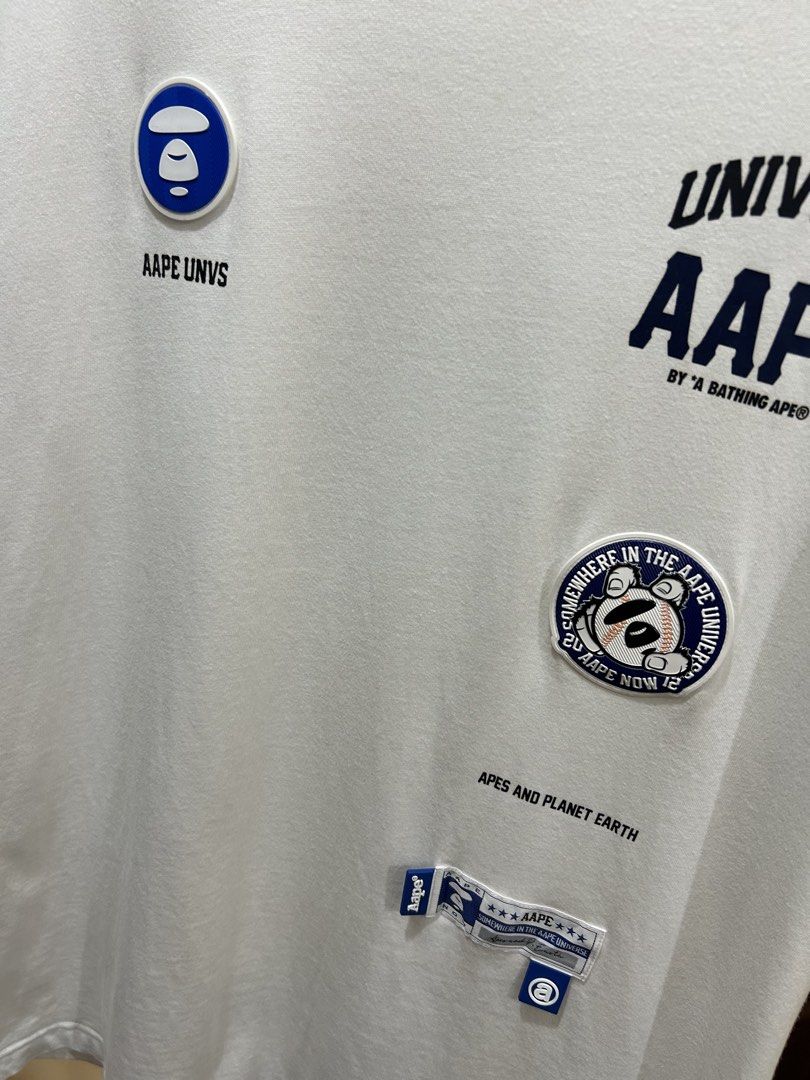 AAPE by A Bathing Ape White Patch T-Shirt (Category: Tshirts & Polo Shirts ) located in Manila. Submitted by cachegoodsuncovers (Listing ID 1467287371, Image 2). Description: Condition:Exellent close to brandnew Color rate:9.5/10 Size:L Dimes:23x30 Issue:none .