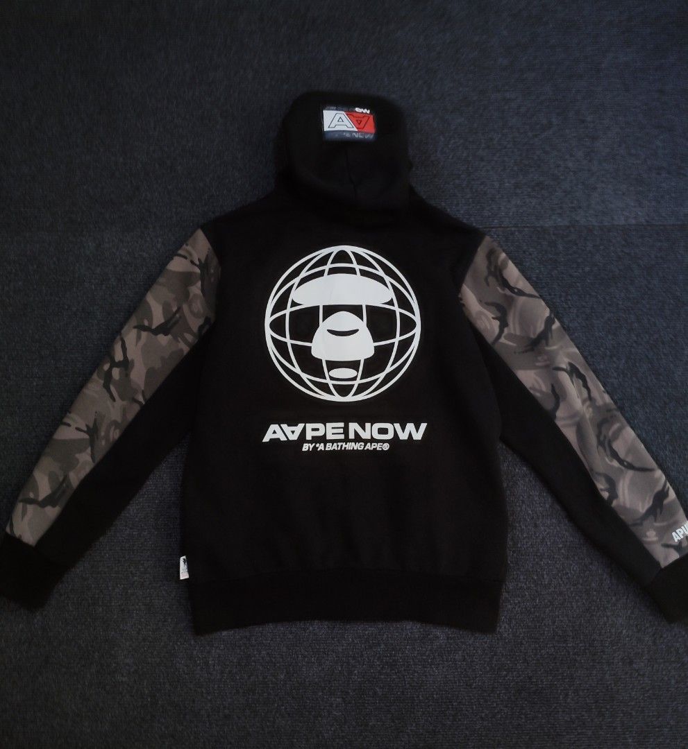 AAPE Split camo hooded varsity jacket (Category: Coats, Jackets and Outerwear) located in Quezon City. Submitted by wgapparel (Listing ID 1467355054, Image 3). Description: 📌 available • Dimes: 20.5 x 25.5 Medium on tag • Conditions: Excellent • Color Rate: 9.2 or better • Complete tags 💯 • Issue: hood print check last pic. Bawal sa maselan Solid ng graphic design and colorway. 🫶 Mine 2280 ( free shipping ) Location Quezon City Shipping via La