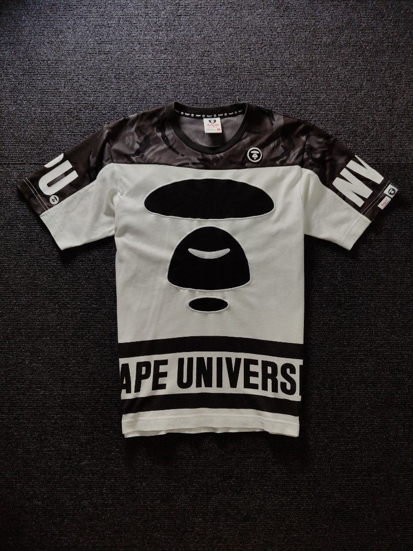 AAPE Split Camo mesh jersey tshirt (Category: Tshirts & Polo Shirts ) located in Quezon City. Submitted by wgapparel (Listing ID 1467357359, Image 2). Description: 📌 available • Dimes: 18.5 x 26 W/L Small on tag • Conditions: Brand new condi • Color Rate: 9.5 / better • Complete tags • Authentic 💯 • Issue: None, all prints no basag Pogi neto, embroidery line ng moonface 🫡 Mine 1600 ( free shipping ) Location Quezon City Shipping via Lalamove o