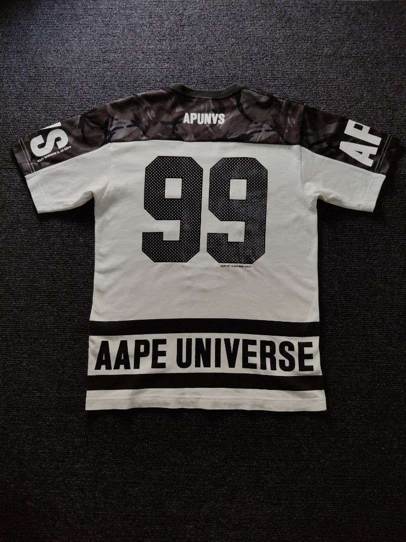 AAPE Split Camo mesh jersey tshirt (Category: Tshirts & Polo Shirts ) located in Quezon City. Submitted by wgapparel (Listing ID 1467357359, Image 3). Description: 📌 available • Dimes: 18.5 x 26 W/L Small on tag • Conditions: Brand new condi • Color Rate: 9.5 / better • Complete tags • Authentic 💯 • Issue: None, all prints no basag Pogi neto, embroidery line ng moonface 🫡 Mine 1600 ( free shipping ) Location Quezon City Shipping via Lalamove o
