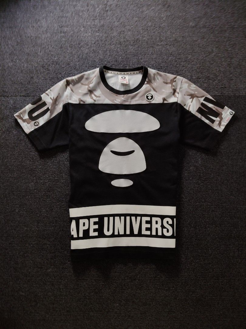 AAPE Split Camo mesh jersey tshirt (Category: Activewear) located in Quezon City. Submitted by wgapparel (Listing ID 1467357445, Image 3). Description: 📌 available • Dimes: 18 x 25.5 W/L Small on tag • Conditions: Brand new condi • Color Rate: 9.5 / better • Complete tags • Authentic 💯 • Issue: None, Walang basag rubber print. Solid ng colorway Mine 1680 ( free shipping ) Location Quezon City Shipping via Lalamove or jnt No COD 💌 DM to purchas