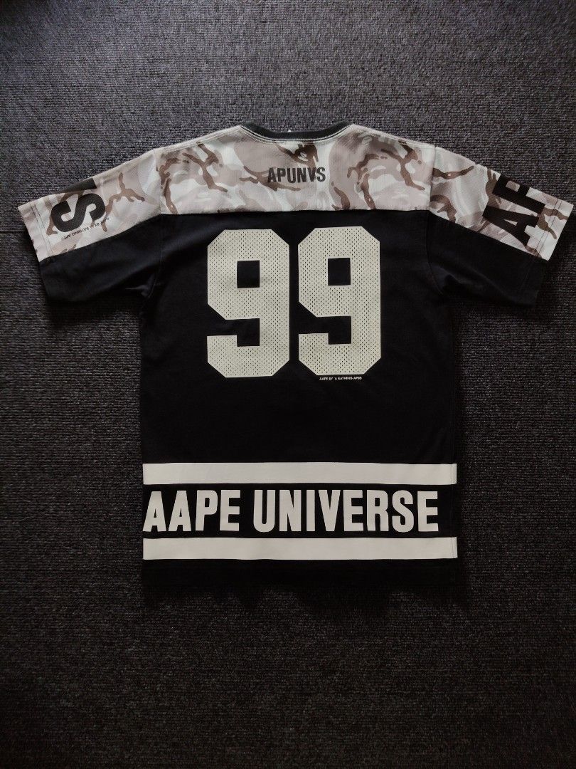 AAPE Split Camo mesh jersey tshirt (Category: Activewear) located in Quezon City. Submitted by wgapparel (Listing ID 1467357445, Image 2). Description: 📌 available • Dimes: 18 x 25.5 W/L Small on tag • Conditions: Brand new condi • Color Rate: 9.5 / better • Complete tags • Authentic 💯 • Issue: None, Walang basag rubber print. Solid ng colorway Mine 1680 ( free shipping ) Location Quezon City Shipping via Lalamove or jnt No COD 💌 DM to purchas