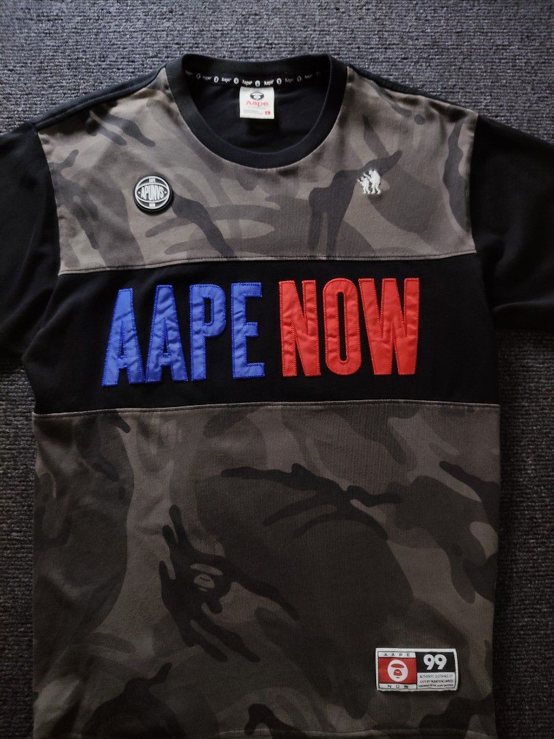 Aape now Grey Camo Black Tee (Category: Tshirts & Polo Shirts ) located in Quezon City. Submitted by wgapparel (Listing ID 1467356894, Image 3). Description: 📌 available • Dimes: 20 x 26 W/L Large on tag • Conditions: Excellent • Color Rate: 9.2 • Complete tags • Authentic 💯 • Issue: None Ganda nito sobra 🔥 solid colorway With rubberized logo Mine 1680 ( free shipping ) Location Quezon City Shipping via Lalamove or jnt No COD 💌 DM to purchase