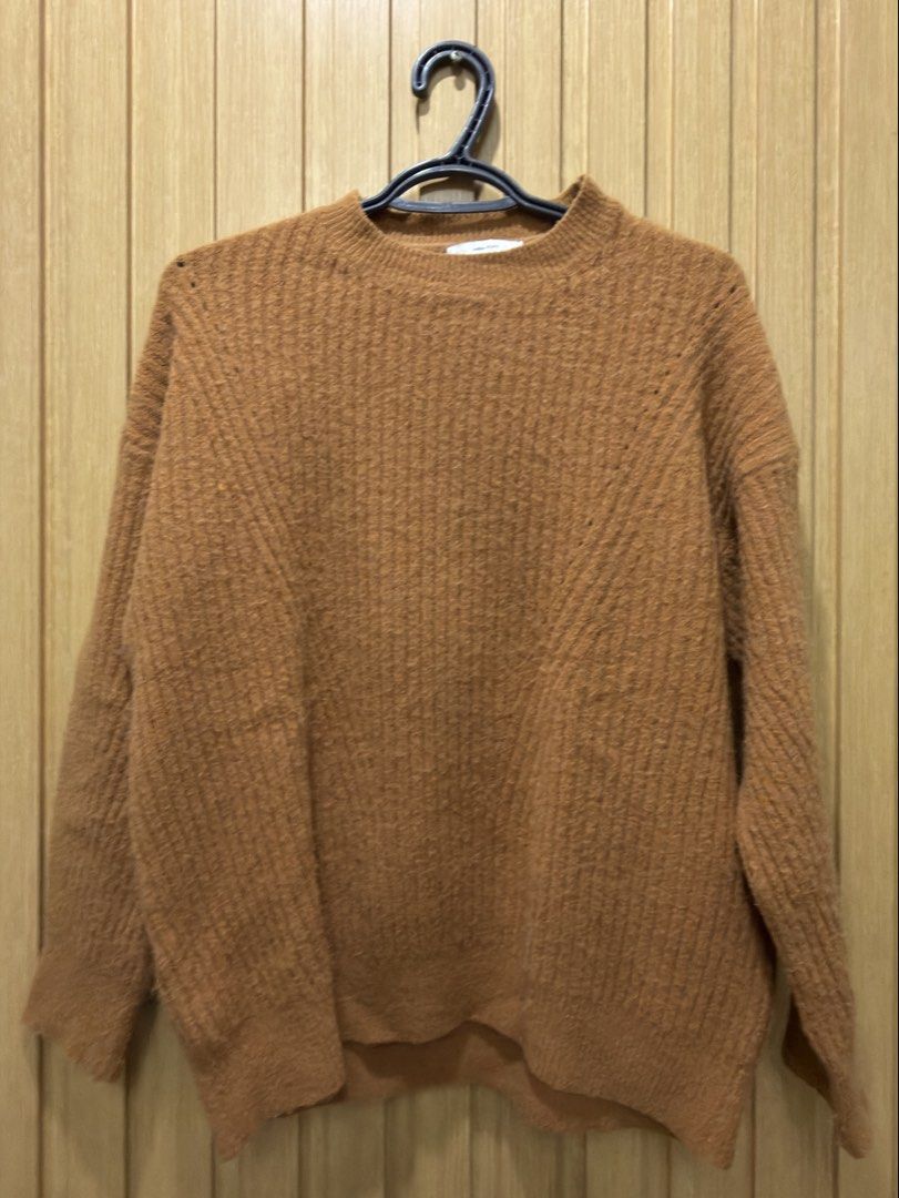 A-Bow Studio Brown Ribbed Knit Sweater (Category: Longsleeves) located in Bacoor. Submitted by preloved_with_love_ (Listing ID 1467334430, Image 1). Description: - Brand: A-Bow Studio - Color/Style: Brown ribbed knit sweater with cozy fuzzy texture - Design: Crew neckline and long sleeves - Measurements: Width 19 inches, Length 25 inches (based on tag) - Versatile neutral piece, easy to pair with jeans or skirts for cooler weather.