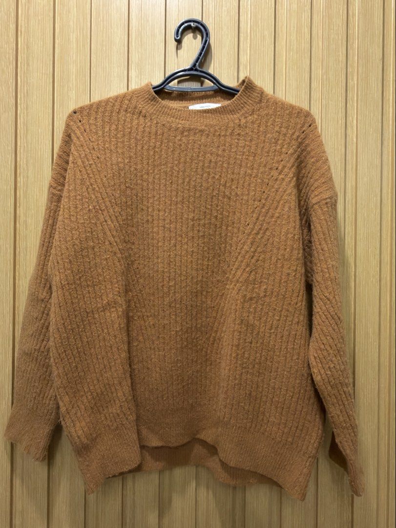 A-Bow Studio Brown Ribbed Knit Sweater (Category: Longsleeves) located in Bacoor. Submitted by preloved_with_love_ (Listing ID 1467334430, Image 2). Description: - Brand: A-Bow Studio - Color/Style: Brown ribbed knit sweater with cozy fuzzy texture - Design: Crew neckline and long sleeves - Measurements: Width 19 inches, Length 25 inches (based on tag) - Versatile neutral piece, easy to pair with jeans or skirts for cooler weather.