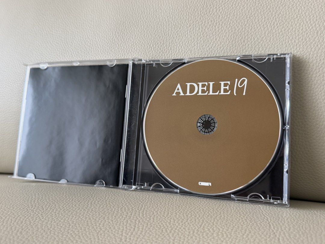 Adele 19 CD (Category: CDs & DVDs) located in Singapore. Submitted by meris (Listing ID 1467229636, Image 2). Description: - Album: Adele - 19 (Debut Album) - Format: Audio CD in standard jewel case - Label: XL Recordings (2008 original release) - Key Tracks: Chasing Pavements, Hometown Glory, Daydreamer - Ideal for: Adele fans and physical music collectors.