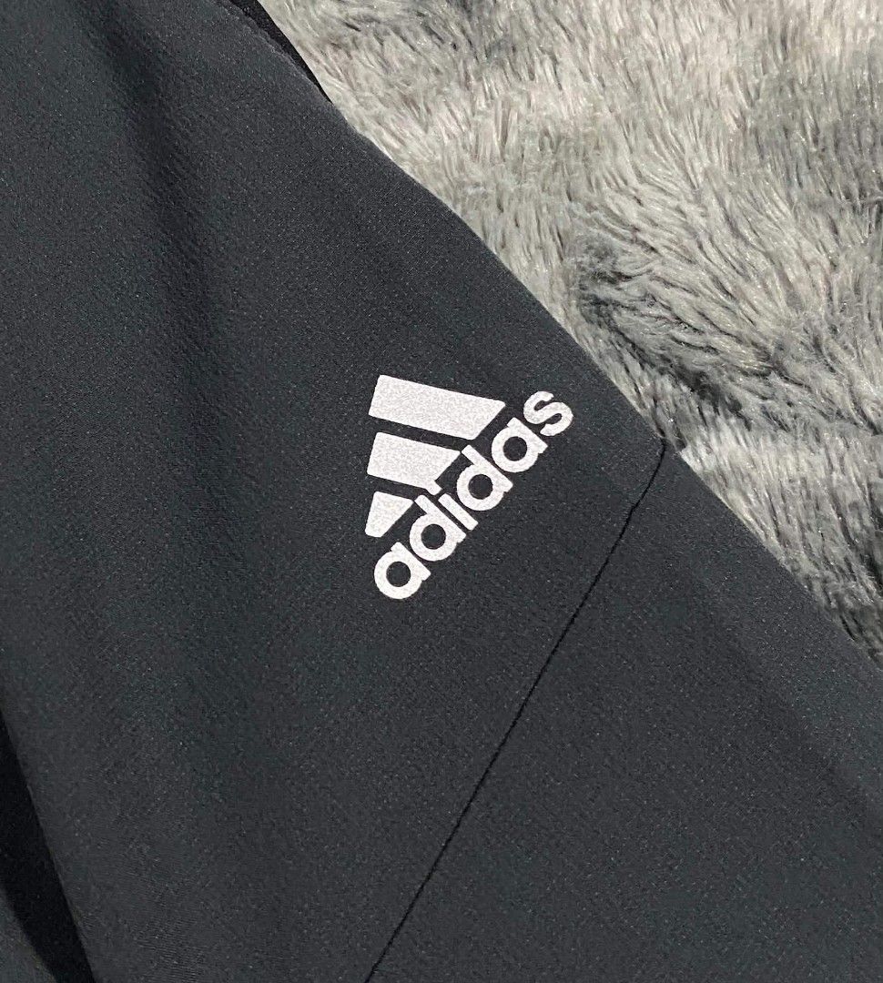Adidas Climalite Athletic Training Joggers Track Pants (Category: Joggers) located in Sorsogon. Submitted by johnmichae69459 (Listing ID 1467308911, Image 2). Description: - Brand: Adidas - Color: Dark grey with contrasting black side panels - Material: 88% polyester, 12% elastane (Climalite lightweight & breathable fabric) - Waistband: Elastic with printed geometric pattern and adjustable inner tag sizing - Logo: Iconic white Adidas logo near th