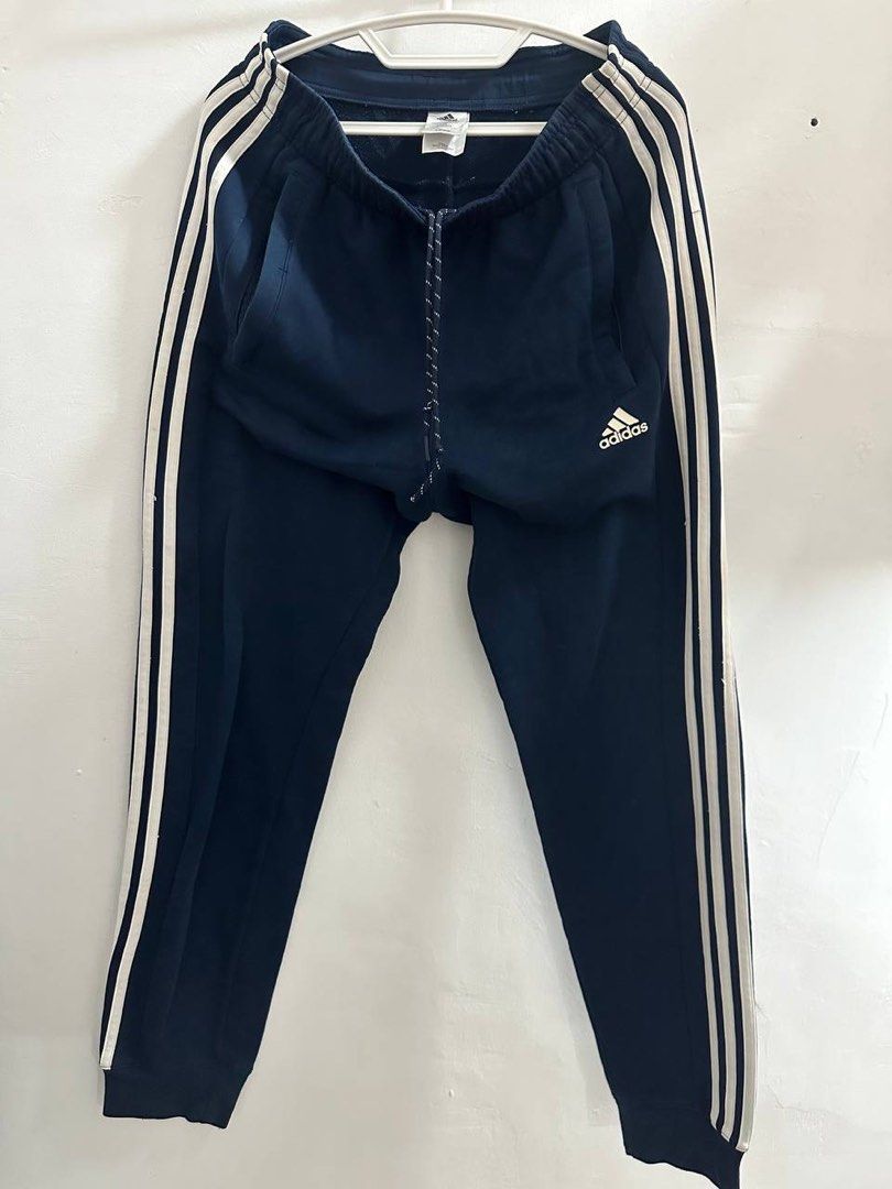 Adidas Climalite Sweatpants (Navy Blue) (Category: Joggers) located in Santa Rosa. Submitted by odepangilinan (Listing ID 1467208503, Image 1). Description: Color: Dark Navy Blue / White Condition: Old stuff but still in good condition 8.5/10 Size: M on tag but fits to Medium to Large.