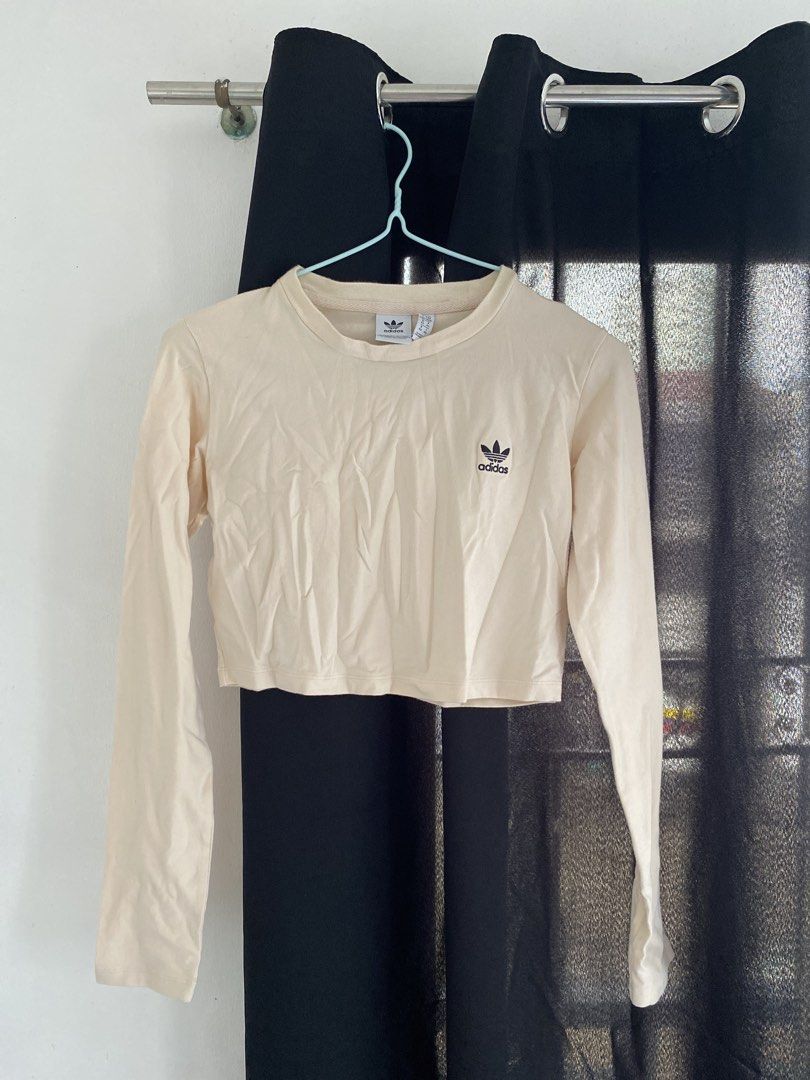 adidas long sleeve crop top (Category: Longsleeves) located in Angono. Submitted by gunguny0gurt (Listing ID 1467176933, Image 1). Description: size: US M / UK 14 - slightly used (2-3 times lang nasuot) - more on cream/slightly pink yung kulay ng damit in person loc: sampaloc, manila sf shouldered by buyer mop: gcash mod: jnt / lalamove can do meet up around ubelt.