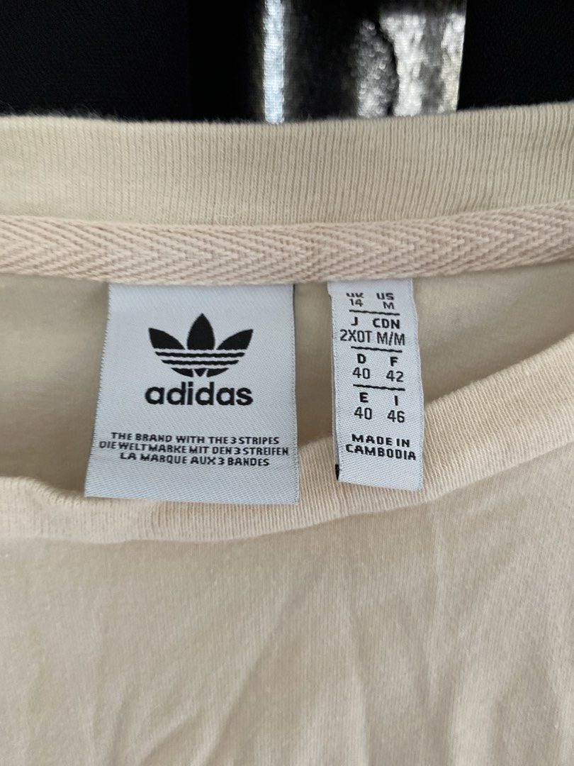 adidas long sleeve crop top (Category: Longsleeves) located in Angono. Submitted by gunguny0gurt (Listing ID 1467176933, Image 3). Description: size: US M / UK 14 - slightly used (2-3 times lang nasuot) - more on cream/slightly pink yung kulay ng damit in person loc: sampaloc, manila sf shouldered by buyer mop: gcash mod: jnt / lalamove can do meet up around ubelt.