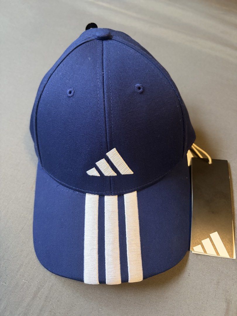 Adidas Navy Blue Cap (Category: Caps & Hats) located in Quezon City. Submitted by b0gsh88 (Listing ID 1467259021, Image 1). Description: - Brand: Adidas - Color: Navy blue - Condition: Brand new with original paper tag attached .