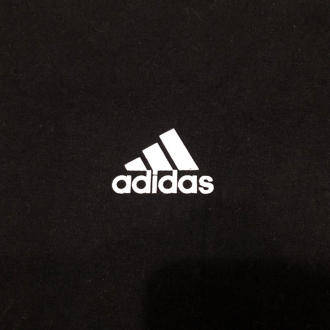 Adidas Real Madrid Black Tee Shirt (Category: Tshirts & Polo Shirts ) located in Manila. Submitted by fashionavenueph (Listing ID 1467240177, Image 2). Description: Size: Medium on Tag but can Fit to M-L Measurements: Width: 20.5 in Length: 29 in Condition: 10/10 Like New Color Rate: 10/10 (Color may vary due to the lighting) History: Bought from Adidas California Outlet (Retail) *Not Thrifted Bought Price: PHP 1600 RFS: Decluttering Issue: None 