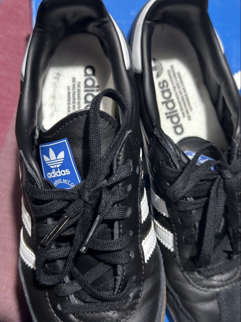 Adidas Samba OG J Black White (Category: Sneakers) located in Santa Maria. Submitted by jewel1980 (Listing ID 1467246376, Image 2). Description: - Item: Adidas Samba OG Sneakers (Black & White) - Size: US 6.5 / UK 6 / FR 39 1/3 - Condition: Excellent leather upper, minor dirt on gum soles from light wear - Inclusions: Original shoe box included (note: box has a side tear) - Style: Classic low-top with iconic three stripes.