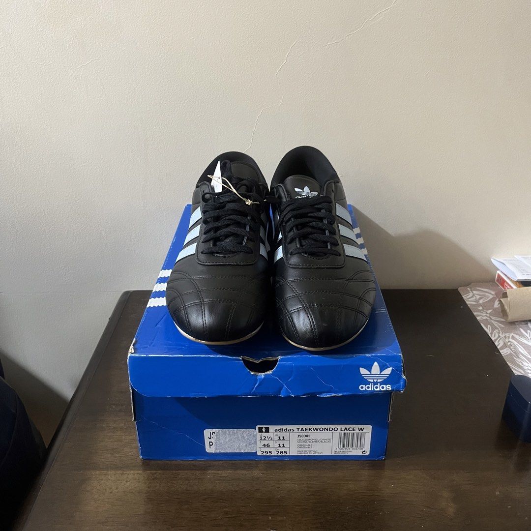 Adidas Taekwondo Lace W (Category: Sneakers) located in Paranaque City. Submitted by edf092579 (Listing ID 1467244916, Image 2). Description: - Colorway: Black and Wonder Blue - Design: Low-profile with classic three stripes and quilted toe detail - Details: Lace-up closure, branded tongue, and heel tab - Condition: Deadstock, 100% brand new and never worn - Packaging: Includes original blue Adidas shoebox.