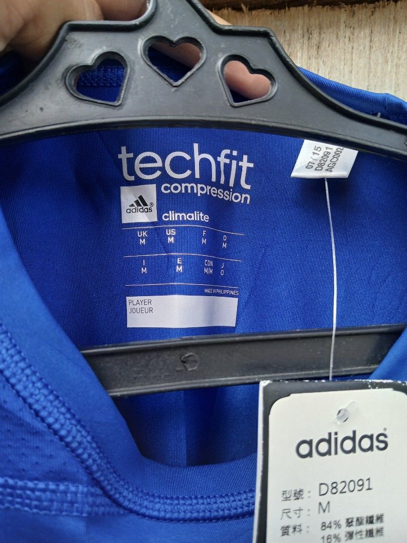 Adidas Techfit Compression Climalite Shirt Blue (Category: Activewear) located in Manila. Submitted by thrift_sixty (Listing ID 1467180271, Image 3). Description: - Brand: Adidas Techfit - Color: Bright Blue - Size: Medium (Standard Fit) - Condition: Brand new with original tags - Material: Climalite fabric for moisture management - Features: Short sleeves, crew neck, classic chest and back branding - Ideal for: Gym workouts, running, and athleti