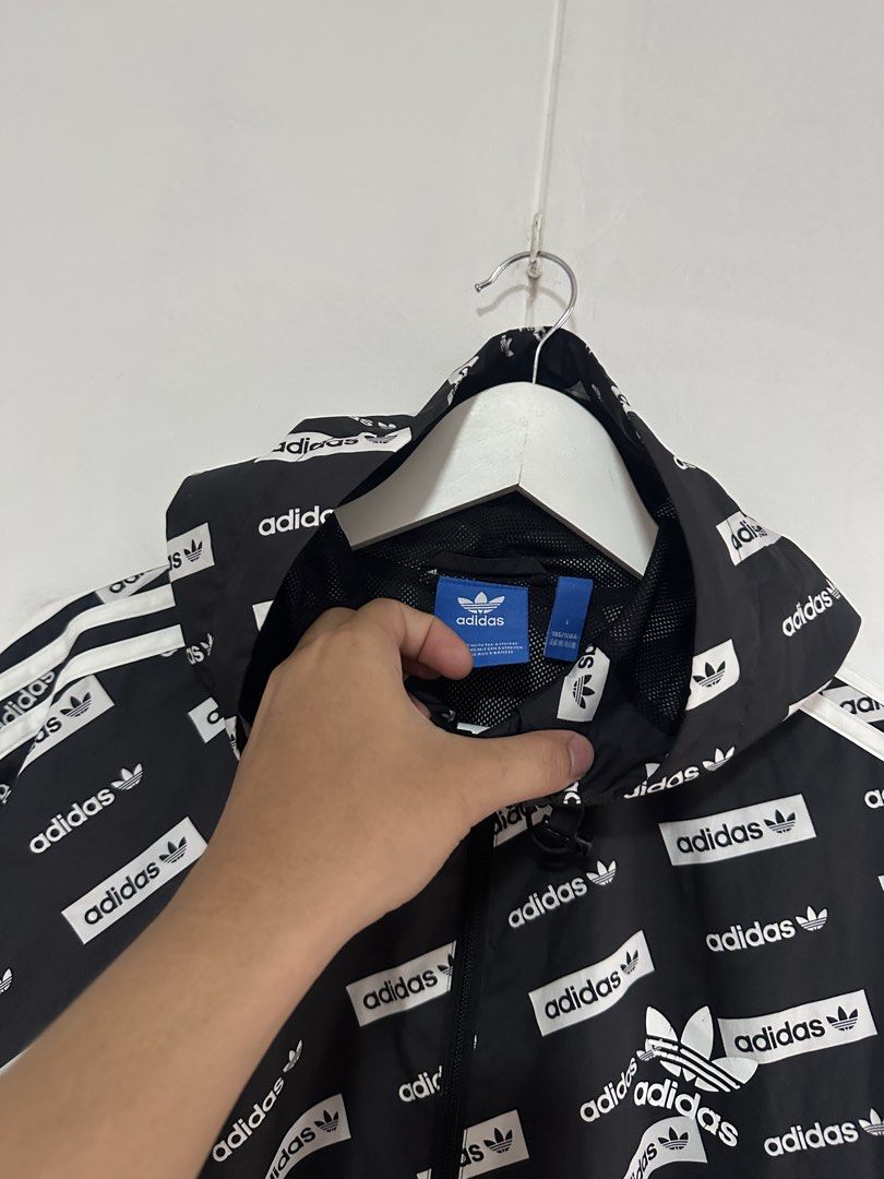 Adidas windbreaker (Category: Coats, Jackets and Outerwear) located in Las Pinas. Submitted by archimedes.joaquin (Listing ID 1467221471, Image 3). Description: Excellent condition -9.5/10 color rate sz L on tag 25” w 29” L - issue: minimal hairline sa chest logo ( super liit ) Authentic .