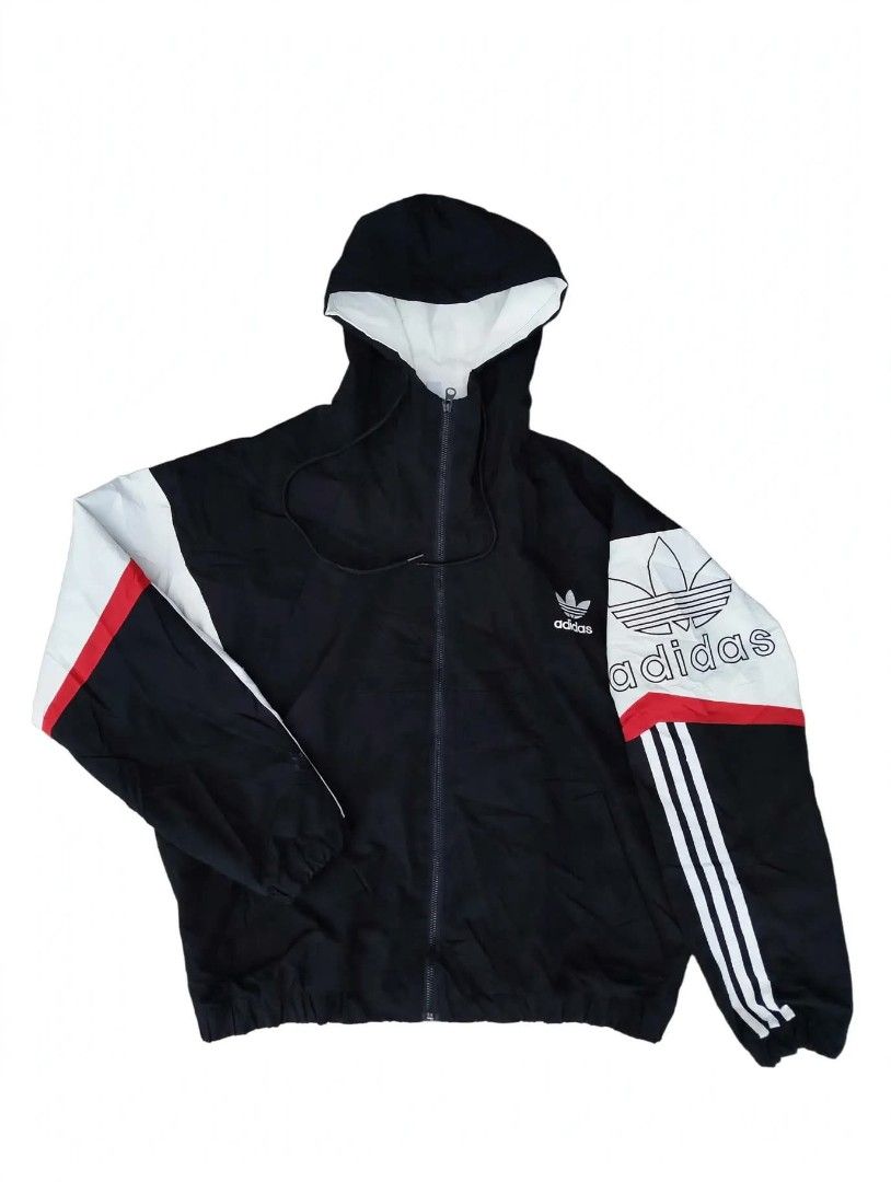 Adidas windbreaker 🔥 (Category: Coats, Jackets and Outerwear) located in Cadiz. Submitted by lyle_ejes0120 (Listing ID 1467313650, Image 1). Description: Adidas windbreaker🔥 Side logo and chest both embroidered and two pockets on front. L on tag Dimes Length 27 Width 25 Length of sleeve 23 Like new condition No issues Color rate 10/10.