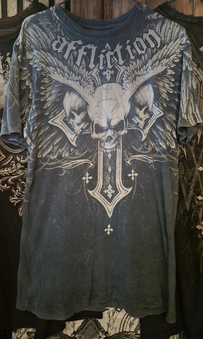 Affliction Demon Eyes GRAIL (Category: Tshirts & Polo Shirts ) located in Cebu City. Submitted by rurushuu (Listing ID 1467206283, Image 1). Description: 21x28 Size small 3 pinholes 7500 (reason is becayuse i bought it intl.) free shipping nationwide slight nego.