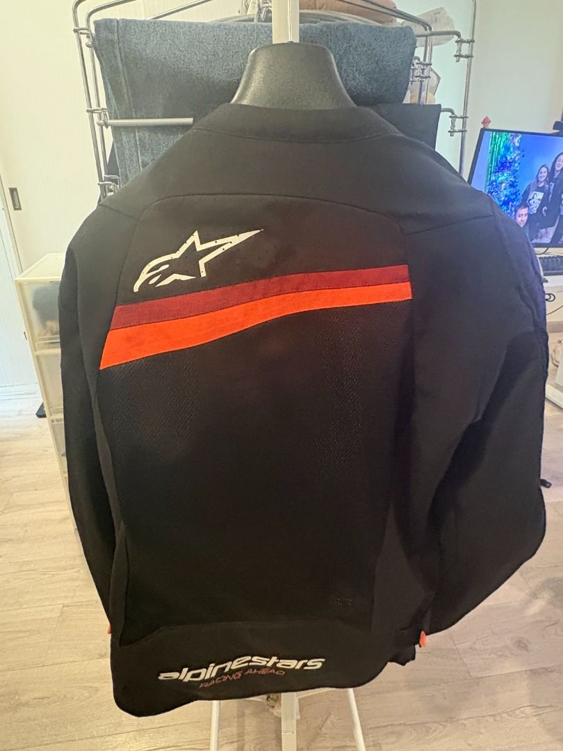 Alpinestars T-GP Plus V4 Airflow Motorcycle Jacket (Category: Coats, Jackets and Outerwear) located in Taguig. Submitted by pat.dd (Listing ID 1467223106, Image 2). Description: - Brand/Model: Alpinestars Alpinestars T-GP Plus V4 Airflow Air Mesh Motorcycle Jacket - with shoulder and arm armor - Color: Black with striking red accents and iconic logos on chest, back, and shoulders - Size: Large - Condition: Like new, comes with original user bookl