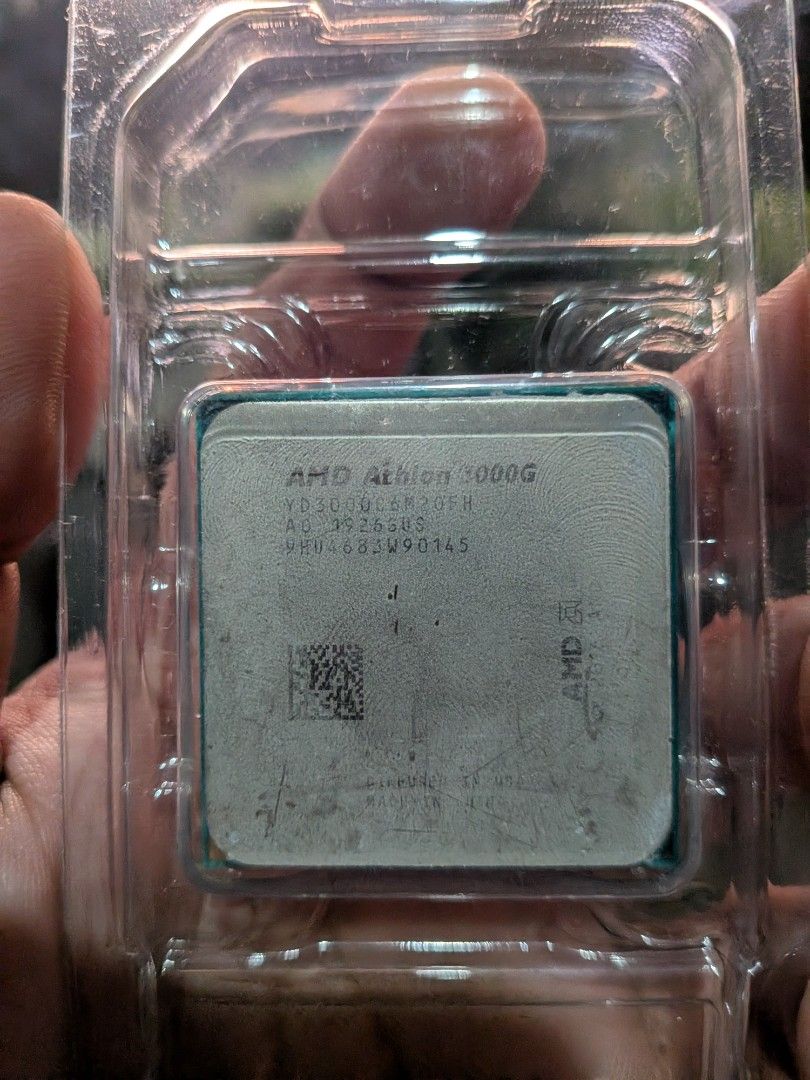 AMD Athlon 3000G Processor (Category: Computer Parts) located in San Jacinto. Submitted by jigssaw (Listing ID 1467269217, Image 1). Description: - Working and tested on two AM4 motherboards - Processor: AMD Athlon 3000G with integrated graphics - Socket: AM4 desktop CPU - Condition: Pulled from a working setup, 100% straight and clean pins (no bent pins) - Packaging: Packed securely in plastic blister packaging and a cardboard box.