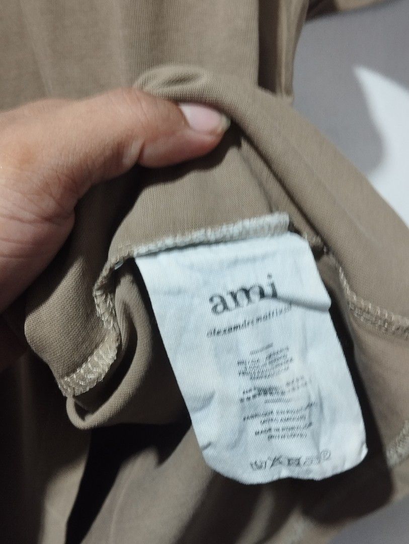 AMI Embossed Logo (Category: Tshirts & Polo Shirts ) located in Bayombong. Submitted by hc_apparel0124 (Listing ID 1467219533, Image 3). Description: Missing Neck tag may Bleach stain lightly loose neckline good for psg only.