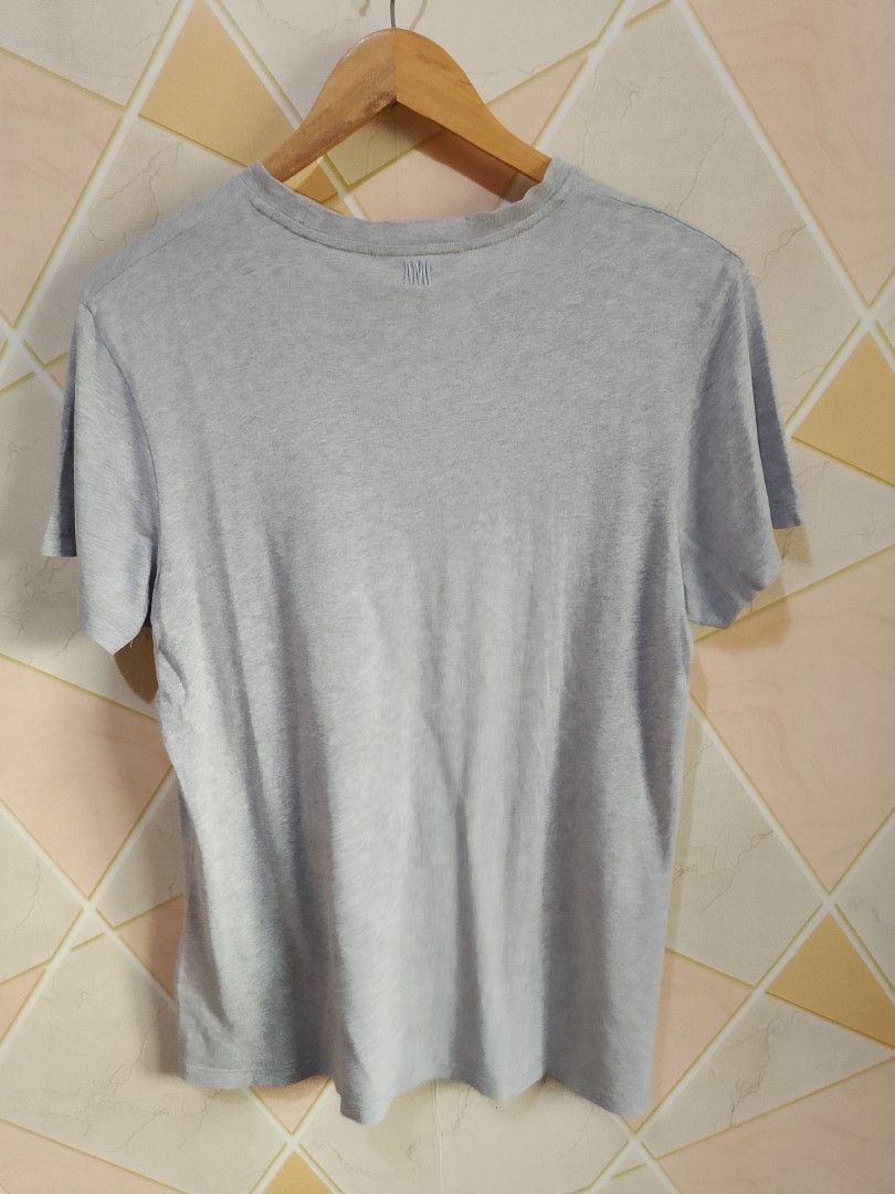 Ami Paris T-Shirt Grey Size S (Category: Tshirts & Polo Shirts ) located in San Pedro. Submitted by jokwanrocks09 (Listing ID 1467255145, Image 2). Description: Grey cotton t-shirt from Ami Alexandre Mattiussi. Small tricolor Ami embroidery on the chest. Matching tonal Ami embroidery under the back neckline. Crew neck and short sleeves. Regular fit, size S. Tag attached inside the collar. 19x26 small .
