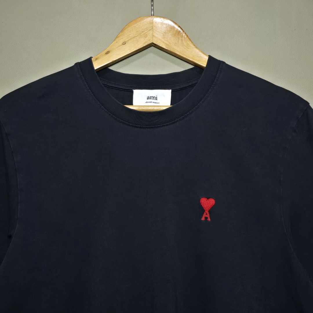 AMI TSHIRT ( Authentic 💯 ) (Category: Tshirts & Polo Shirts ) located in Manila. Submitted by thrift-finds.ph (Listing ID 1467174933, Image 2). Description: AMI TSHIRT ( Authentic 💯 ) - Size: LARGE - Dimension: 20 W" x 28 L" - Good Condition - Color rate: 9.2/10 - Issue: Minor bacon neck - Color may vary due to lighting 📸.
