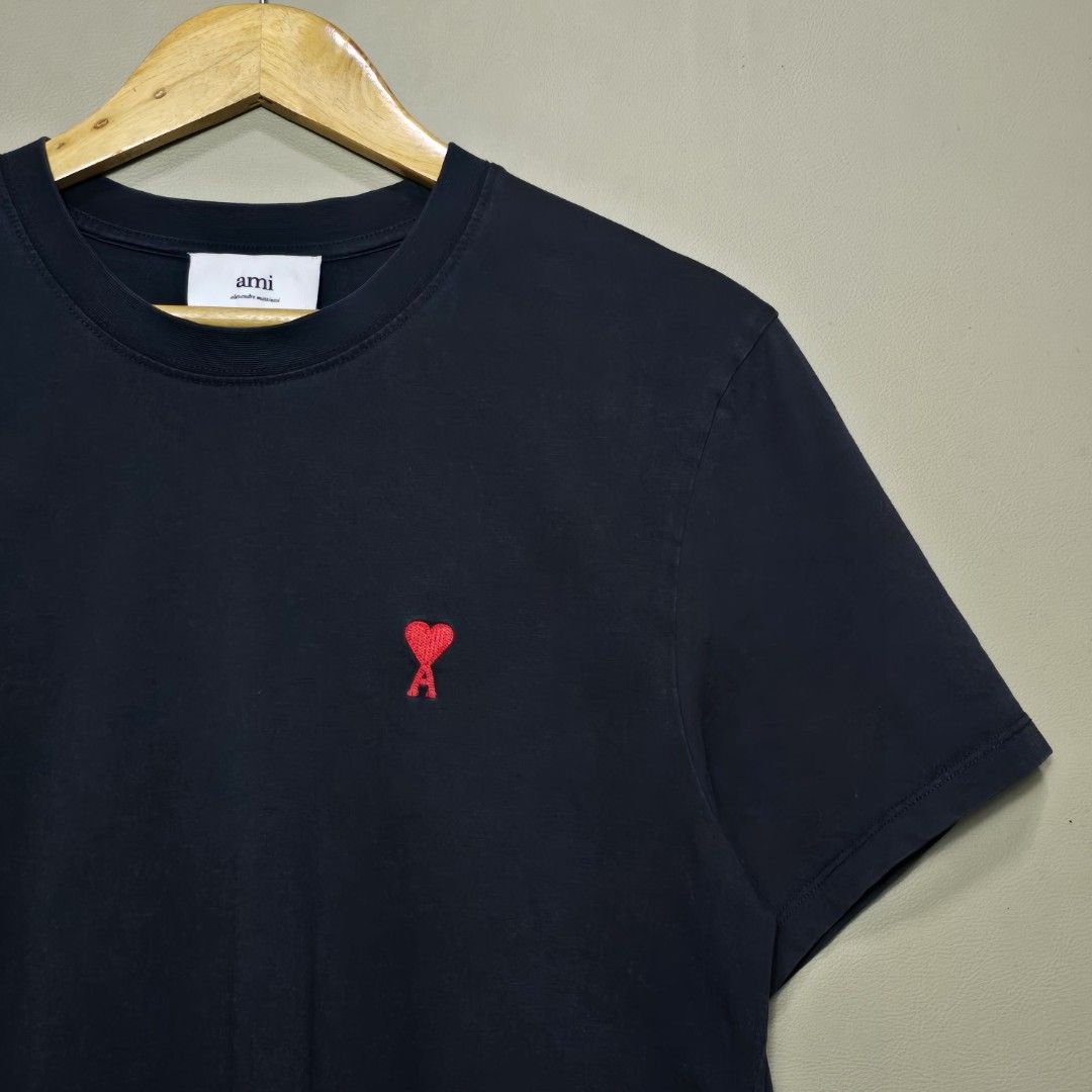 AMI TSHIRT ( Authentic 💯 ) (Category: Tshirts & Polo Shirts ) located in Manila. Submitted by thrift-finds.ph (Listing ID 1467174933, Image 3). Description: AMI TSHIRT ( Authentic 💯 ) - Size: LARGE - Dimension: 20 W" x 28 L" - Good Condition - Color rate: 9.2/10 - Issue: Minor bacon neck - Color may vary due to lighting 📸.