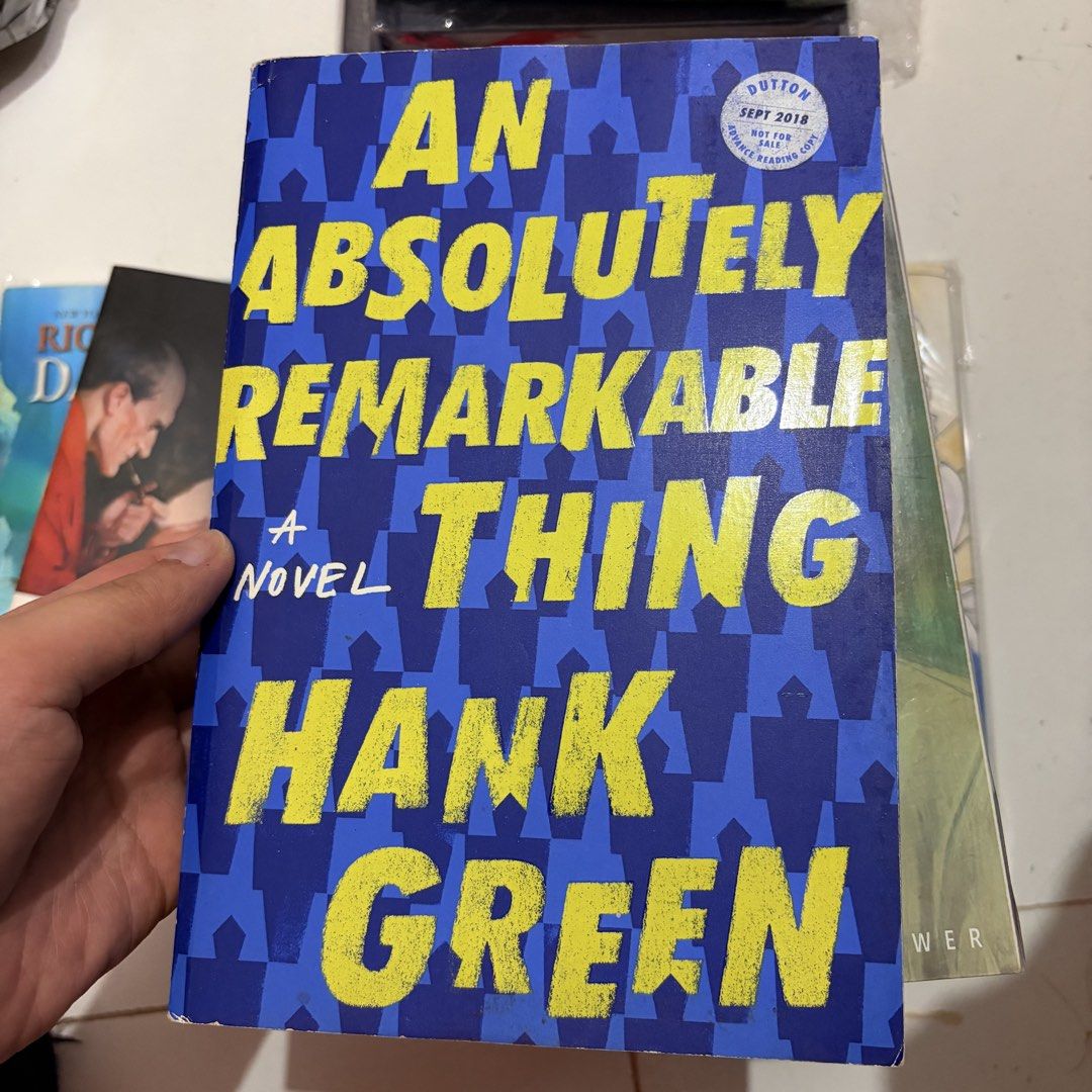 An Absolutely Remarkable Thing by Hank Green ARC (Category: Storybooks) located in General Trias. Submitted by hayami.clo (Listing ID 1467288637, Image 1). Description: - Title: An Absolutely Remarkable Thing by Hank Green - Format: Softcover Advance Reading Copy / Uncorrected Proof (Dutton, Sept 2018) - Special Feature: Gorgeous stenciled edges with 'Don't Stop Me Now' - Condition: Read once with minor edge/corner shelf wear; spine is intact and