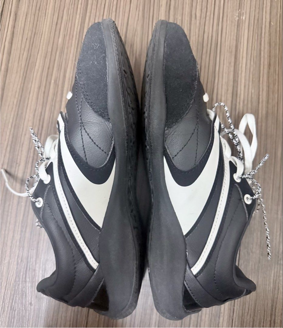 ANTA Keli Low-Top Sneakers (Category: Sneakers) located in Makati City. Submitted by cudiasemsem_04 (Listing ID 1467333961, Image 2). Description: Colorway: mix of matte black, ivory white, and subtle silver or titanium metallic accents.