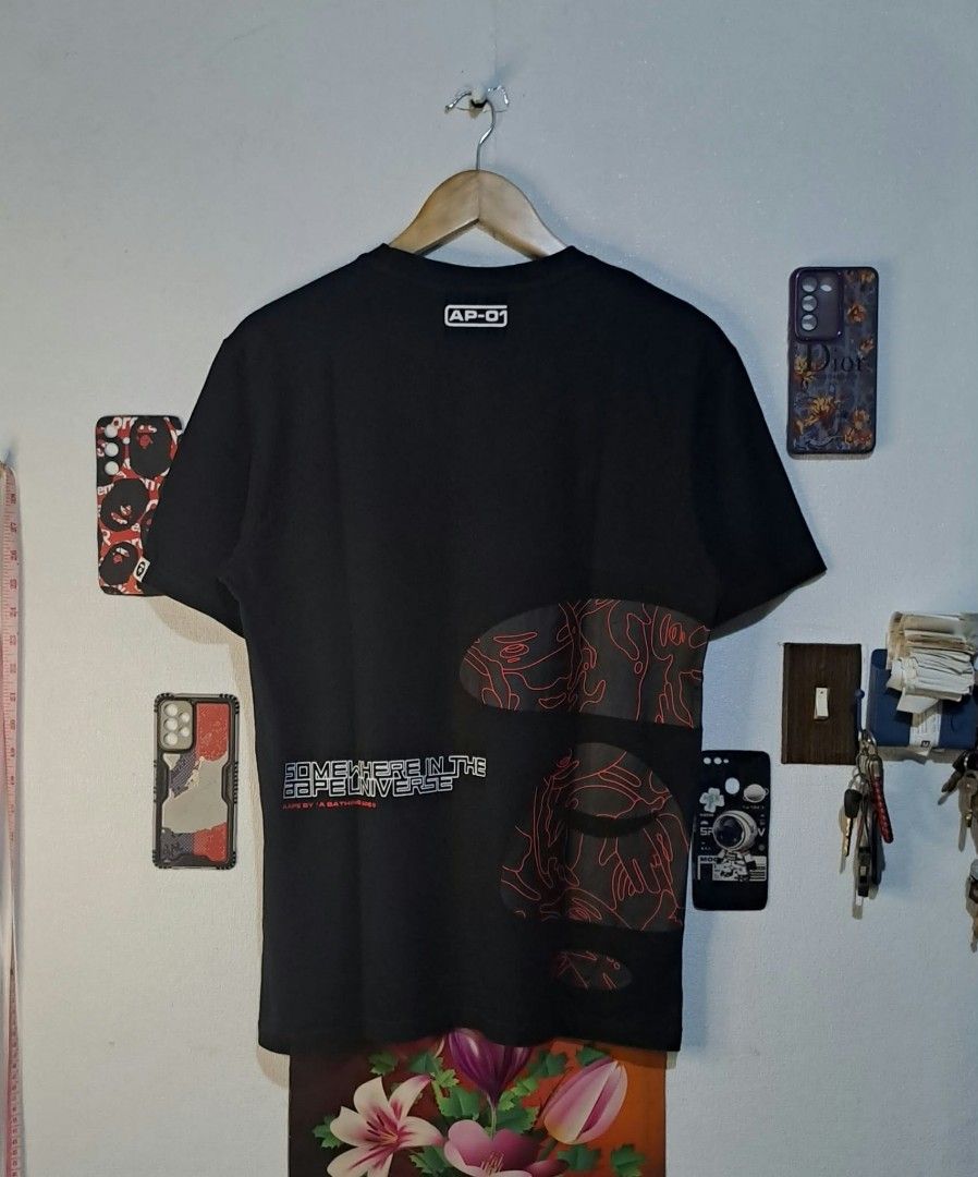 AP - 01 Aape By A Bathing Ape (Category: Tshirts & Polo Shirts ) located in Quezon City. Submitted by yaseen73 (Listing ID 1467357049, Image 1). Description: AP - 01 Aape By A Bathing Ape Black Short - Sleeve Red Toned Ape Head Camouflage Wearing Size : Small / Medium Width '20 Length '27 Color Rate : 9.9/10 No Issue Nearly New Condition 🔥🔥🔥 PRE - OWNED 🔥🔥🔥 800 or Best Offer Courier : J&T Lalamove MOP : G C A S H B A N K T R A N S F E R Sel