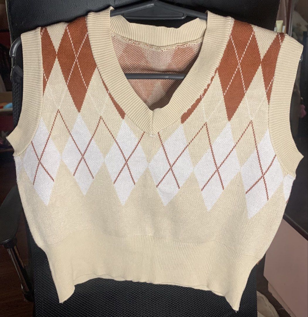 Argyle Knit Sweater Vest Cream Brown (Category: Shirts) located in Santa Rosa. Submitted by annydeclutters (Listing ID 1467221334, Image 1). Description: - Material: Soft and comfortable knit fabric - RFS: Decluttering .