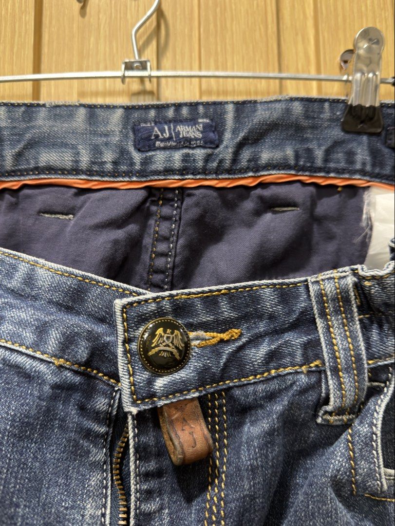 Armani Jeans Denim Jeans Size 32 / 33 (Category: Jeans) located in Bacoor. Submitted by preloved_with_love_ (Listing ID 1467255402, Image 3). Description: - Brand: Armani Jeans - Color/Wash: Dark blue wash - Waist: Elastic waistband for all-day comfort - Closure: Branded button and custom front zipper pull - Pockets: Classic five-pocket setup with stitched back pockets - Details: Genuine leather brand patch at the back waistline - Condition: Grea